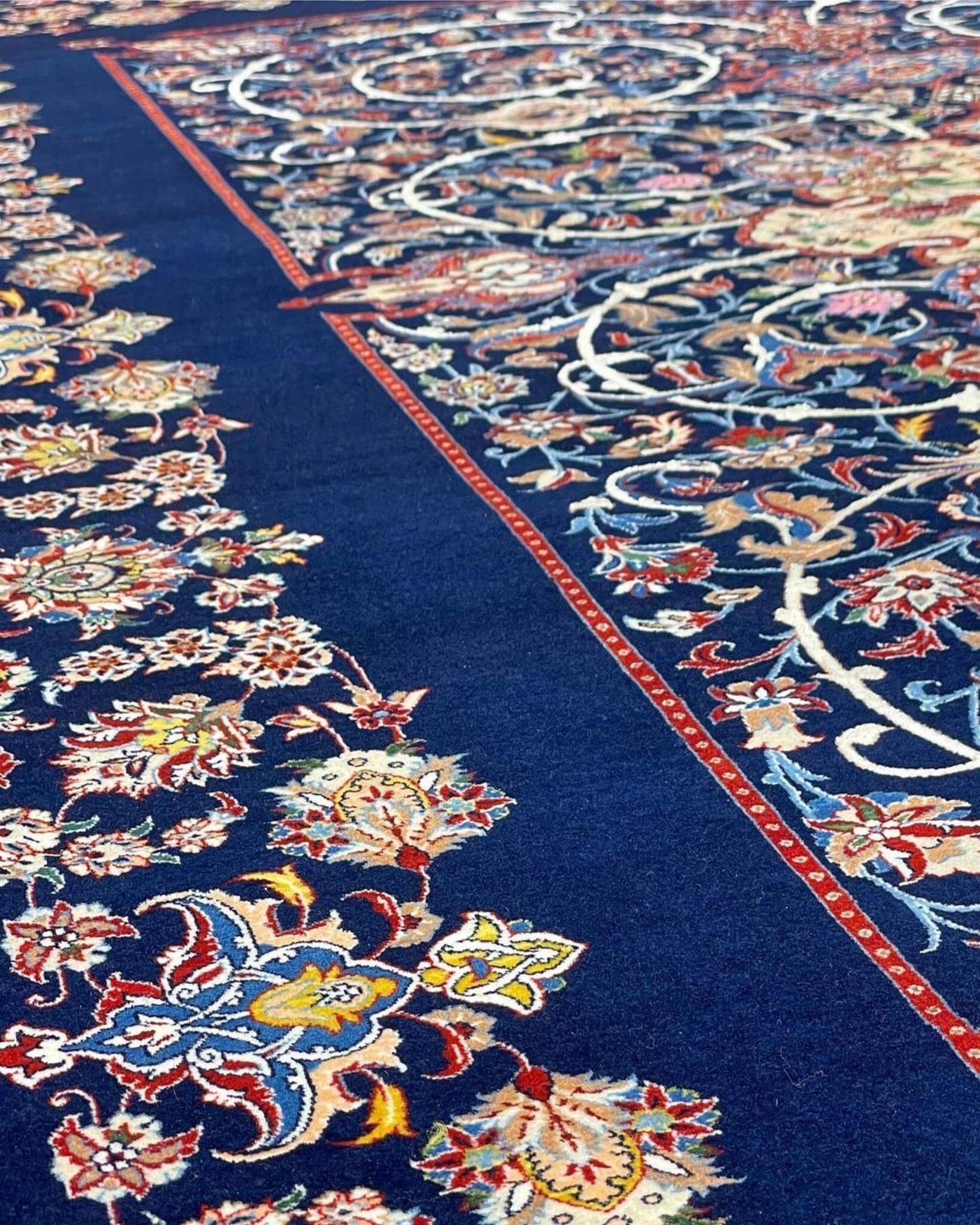 "Master-crafted handwoven rug with silk and wool blend from Isfahan."